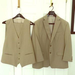 Men’s 3 piece Calvin Klein pinstriped suit.